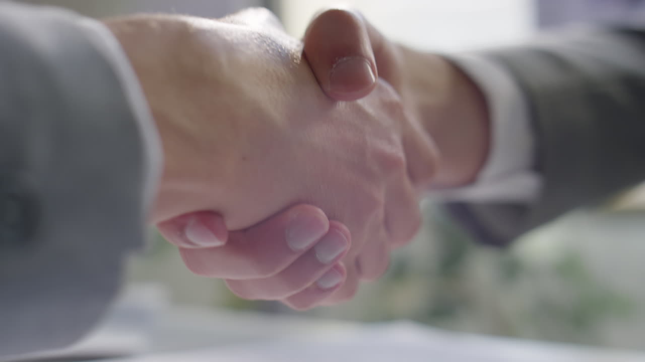 Handshake of Business Partners Making Deal