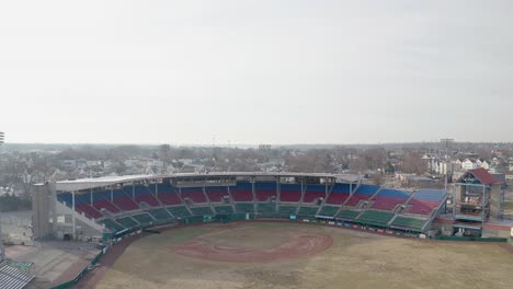 McCoy-Stadium-in-Pawtucket-Rhode-Island,-wide-revealing-drone-shot-of-abandoned-stadium,-aerial