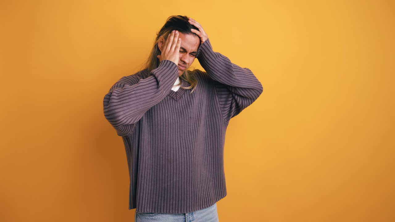 Young Man Suffering from Headache and Chest Pain