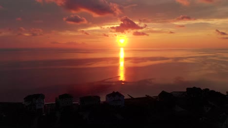 this cinematic drone shot was shot in outer banks when the sun is just setting one the ocean