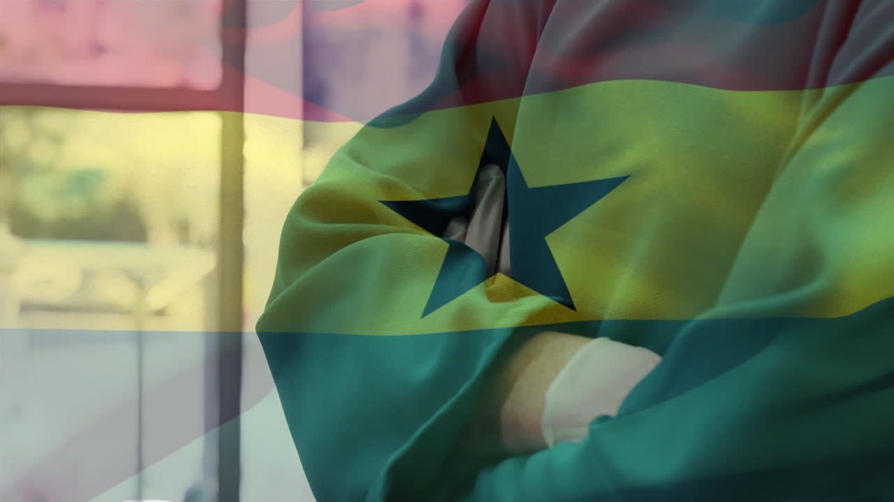 Animation of flag of ghana waving over surgeon in hospital