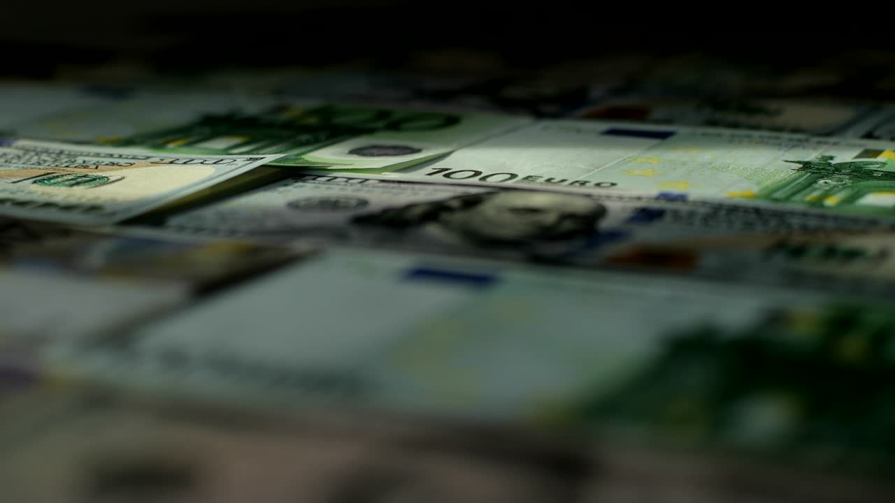 Euro, US dollar, international paper money. Main word currency US Dollar and Euro bank notes rotating concept business background, loop ready