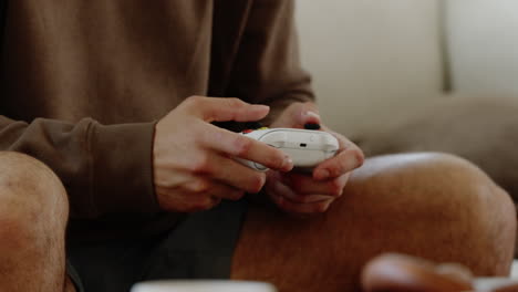 Close-up-of-Hands-Manoeuvring-a-Video-Game-Controller