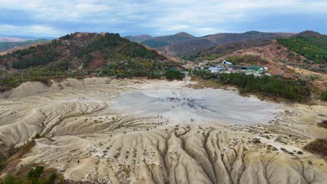 Rotating-Aerial-View-Over-The-Muddy-Volcanoes-in-Buzau-county,-Romania