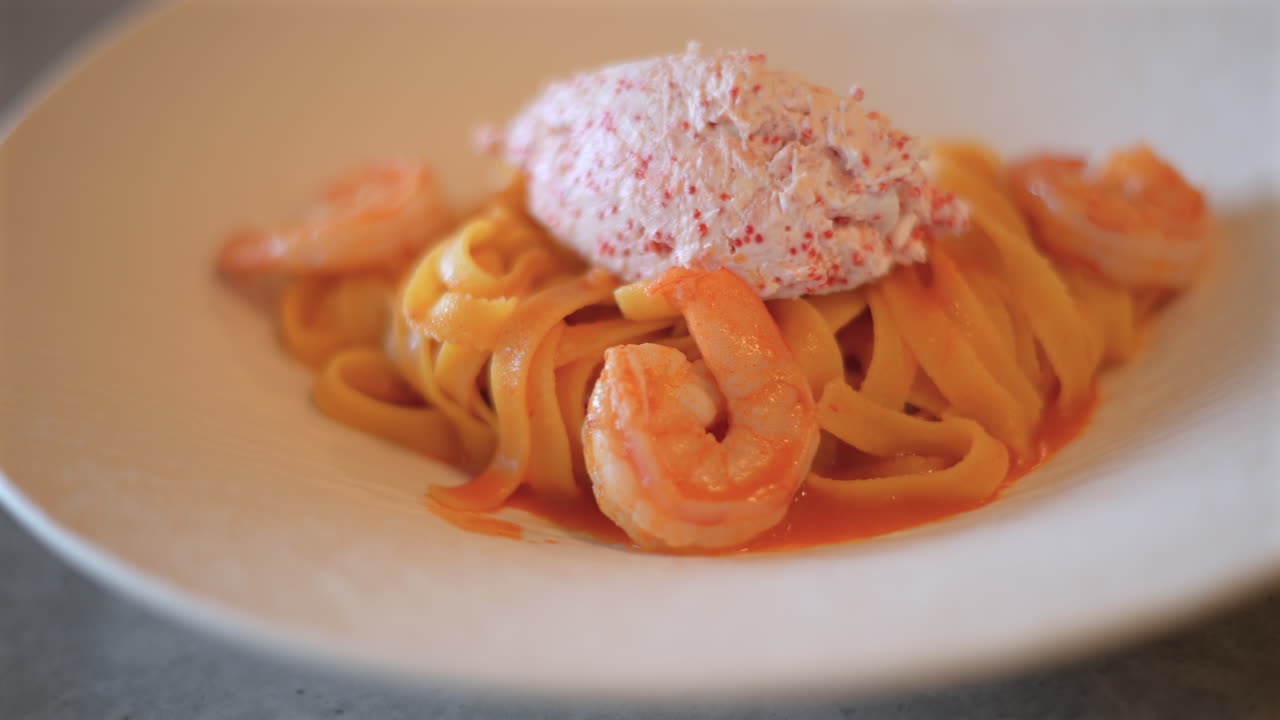 Fresh seafood pasta with shrimps and butter