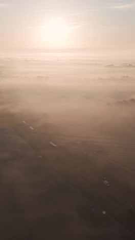 sunrise fog over highway