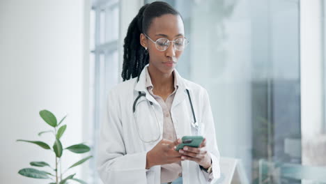 Woman,-smartphone-and-doctor-typing-in-hospital