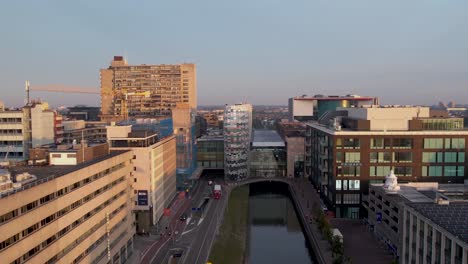 from tea pot to ink pot hoog catharijne central train station in utrecht at sunrise revealing financial and shopping district with modern office buildings