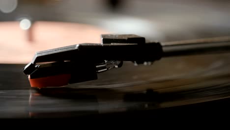 close up of vinyl record on dj turntable record player