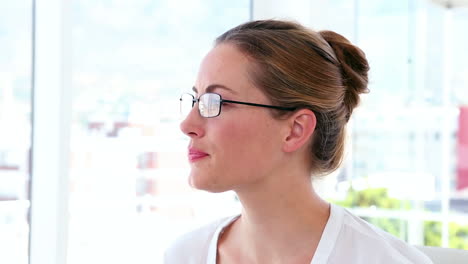 Businesswoman-thinking-at-her-desk