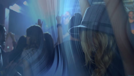 friends raising hands under blue stage lighting haze highlighting fedora for music event marketing