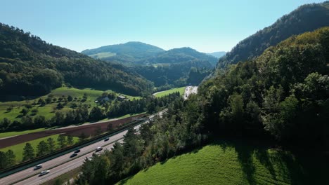 a highway through the beautiful nature of switzerland towards the end of summer