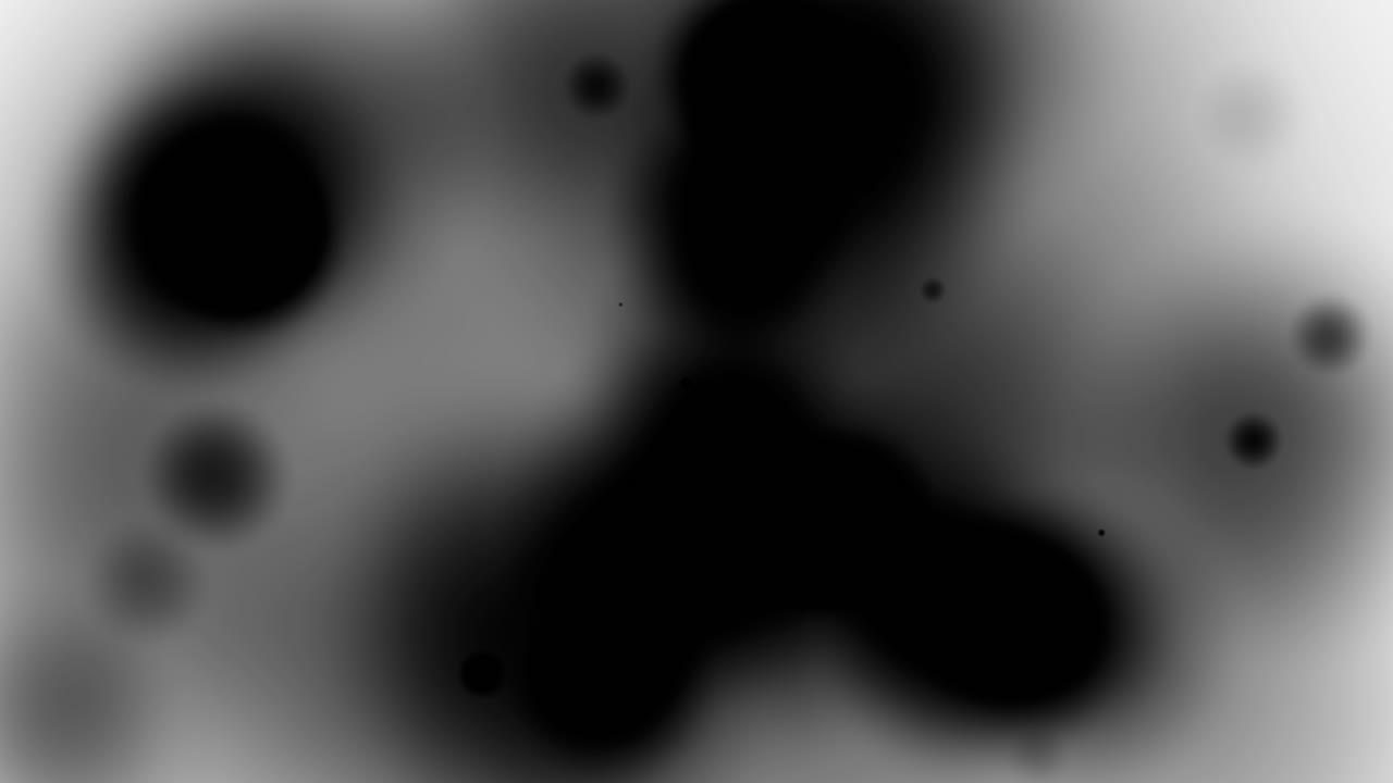 Abstract Black Ink Blots Transitioning on White Background