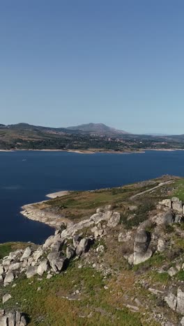 Beautiful Nature Landscape. Blue Lake and Green Mountains Vertical Video