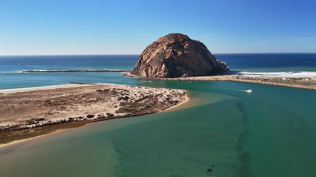 A long, scenic coastal pass capturing beaches, cliffs, and ocean patterns typical of the Central California shoreline