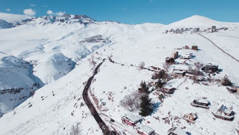 village on the steep snow mountains at farellones near santiago, chile