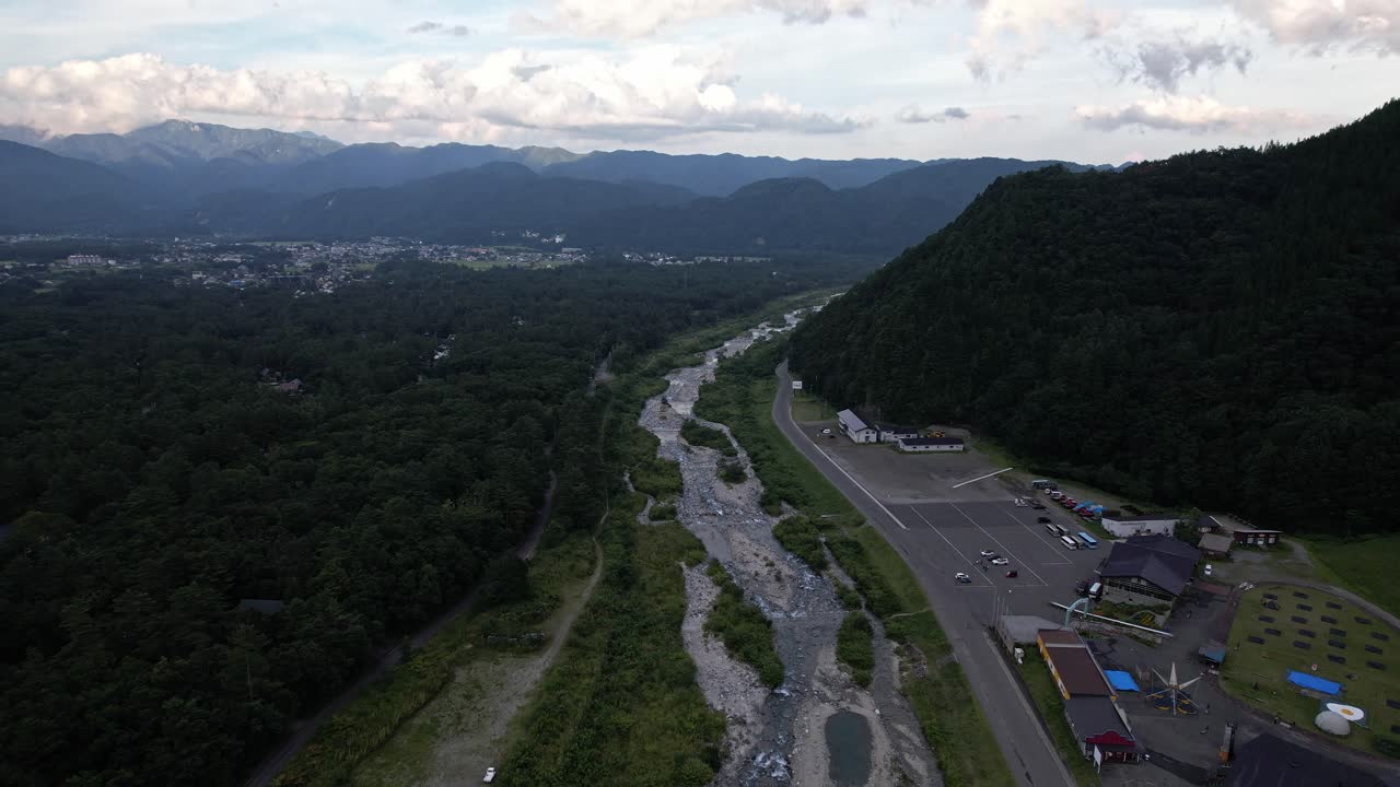 Holiday Accommodations Near Matsukawa River During Summer In Nagano, Kitaazumi District, Hakuba, Japan. Aerial Drone Shot