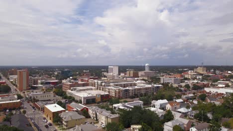 drone shot over historic downtown pensacola in florida on a very cloudy and sunny day-1