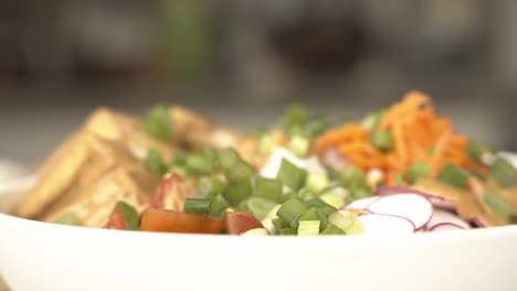 Great-shot-of-poke-bowl-revealing-colorful-vibrant-ingredients-in-a-bowl-raw-food-vegan-food