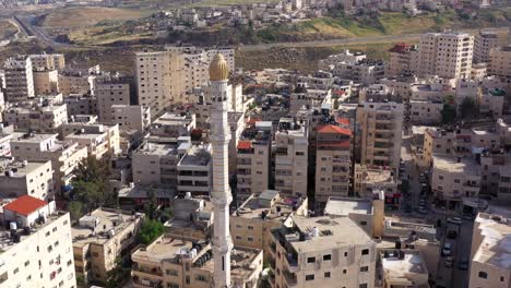 mosque tower minaret in shuafat refugee camp, jerusalem-aerial view