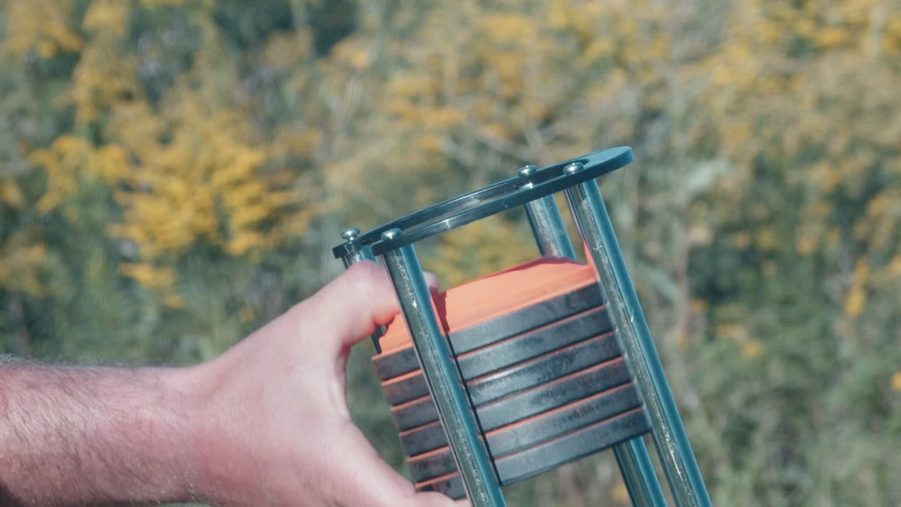 Clay Pigeons loaded into Clay Pigeon Launcher for outdoor target practice