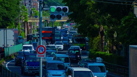 a timelapse of the traffic jam at the urban street in tokyo long shot