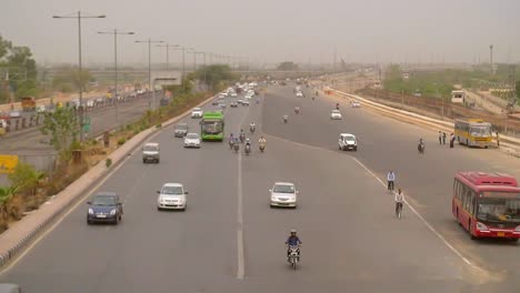 wide shot of traffic on a large indian freeway