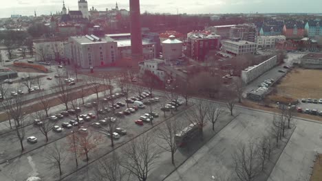 aerial view of a city parking lot and surrounding buildings