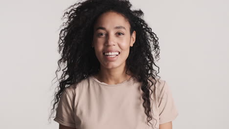 African-american-happy-woman-over-white-background.