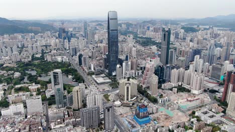 aerial view over shenzhen cityscape with massive urban development and skyscrapers