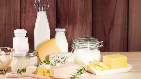 assorted dairy items displayed on wooden surface