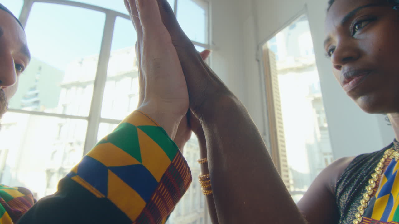 Tango Couple Touching Hands of Each Other in Dance Studio