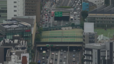 view from the top of mori tower in roppongi of route 246 passing under the aoyama gakuin junior high school tennis courts