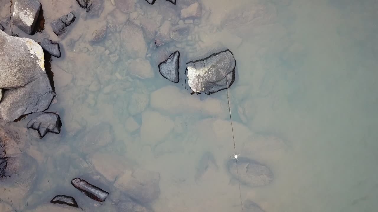 Flying over the beautiful countryside nature of rivers, waterfalls and trees of Brazil