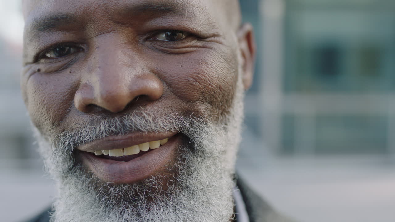 close up portrait of senior african american businessman ceo smiling confident enjoying successful career achievement