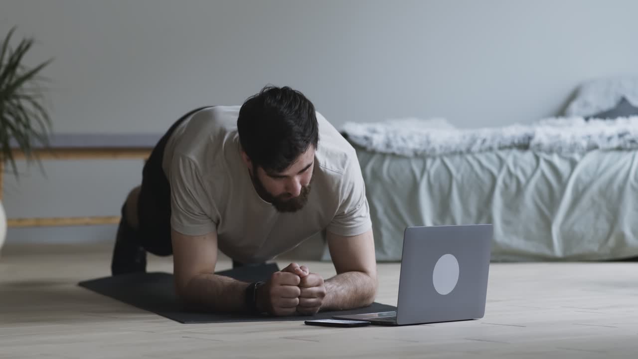 Man Doing Plank Exercise at Home