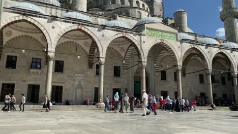 time lapse footage of people visiting historical mosque called "sultanahmet" (blue mosque" in istanbul.