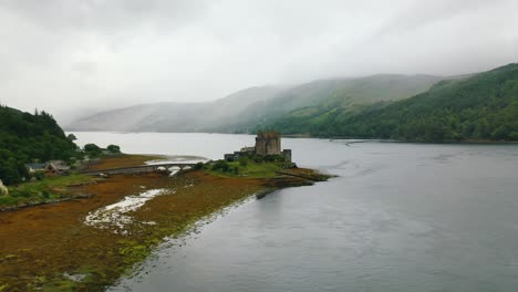 Aerial-View-of-Scottish-Castle-Eilean-Donan-on-Loch-Duich-in-the-Scottish-Highlands,-Scotland,-United-Kingdom