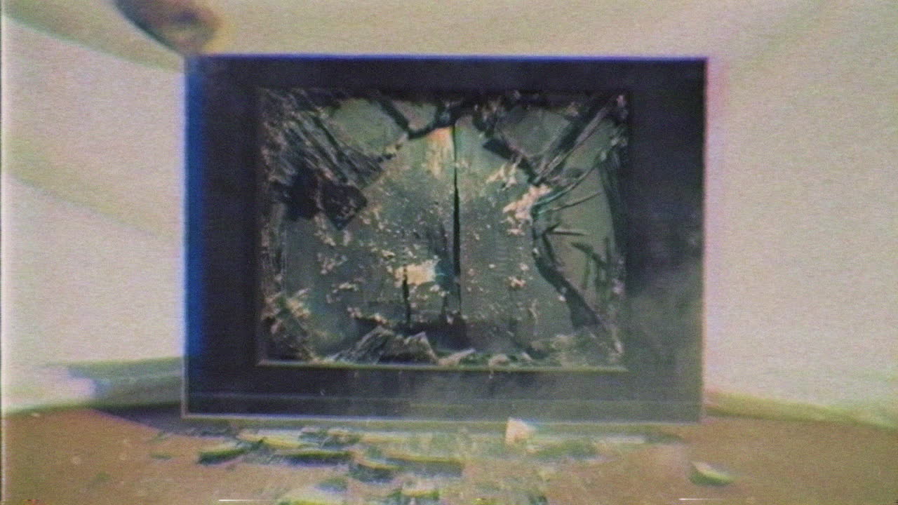 Hand Smashing Vintage CRT Television with Green Screen