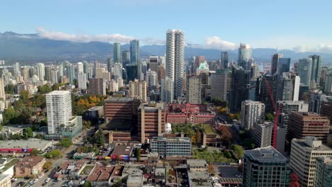 skyscrapers in city of vancouver in british columbia, canada. drone pullback shot