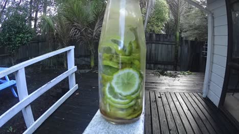 honey flowing in the bottle with lime.mp4