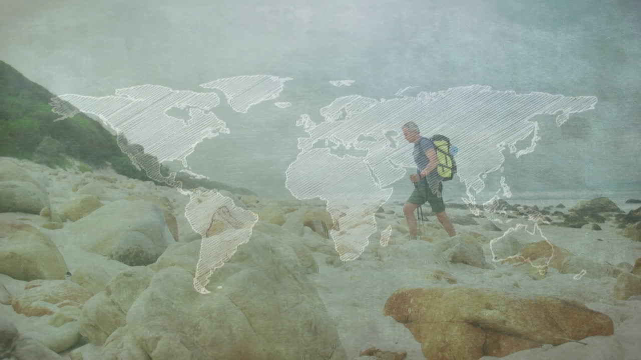 Hiker traversing coastline carrying yellow backpack holding hiking pole, showing travel map overlay