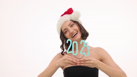 Young Woman in Santa Hat Celebrating New Year 2025