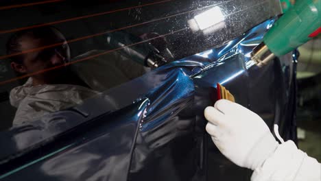 applying car window tint