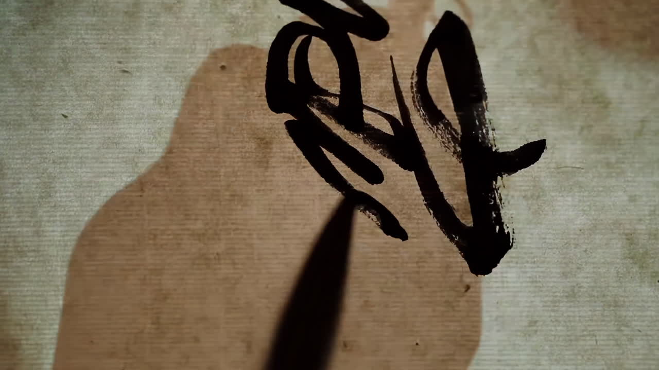 Artistic handwritten writing inspiration through traditional oriental calligraphy with brush and ink, with oriental culture artifacts, preserved in the Temple of Confucius