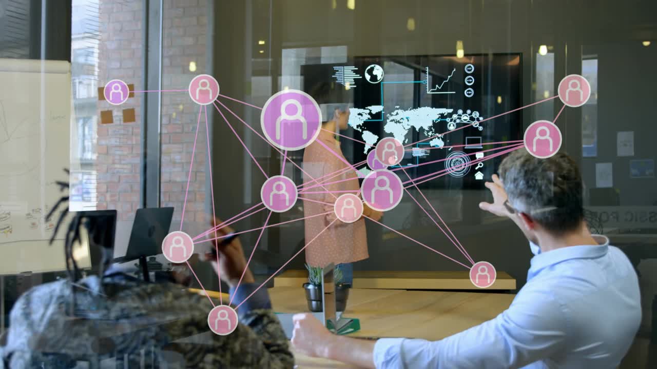 Presenter tapping screen, activating AR network, nodes expanding while business team planning scale