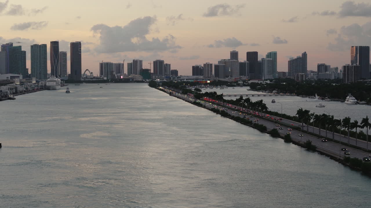 Miami Skyline at Sunset with Traffic on the Highway