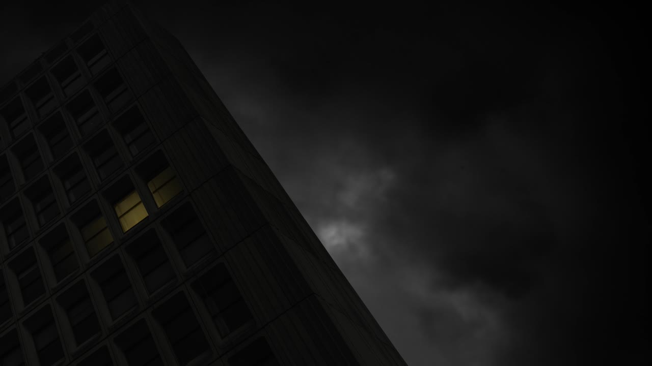 Flashlight In A Window At Night