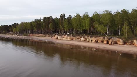 Red-sandstone-cliffs-at-Baltic-sea-coast-Veczemju-klintis-aerial-view