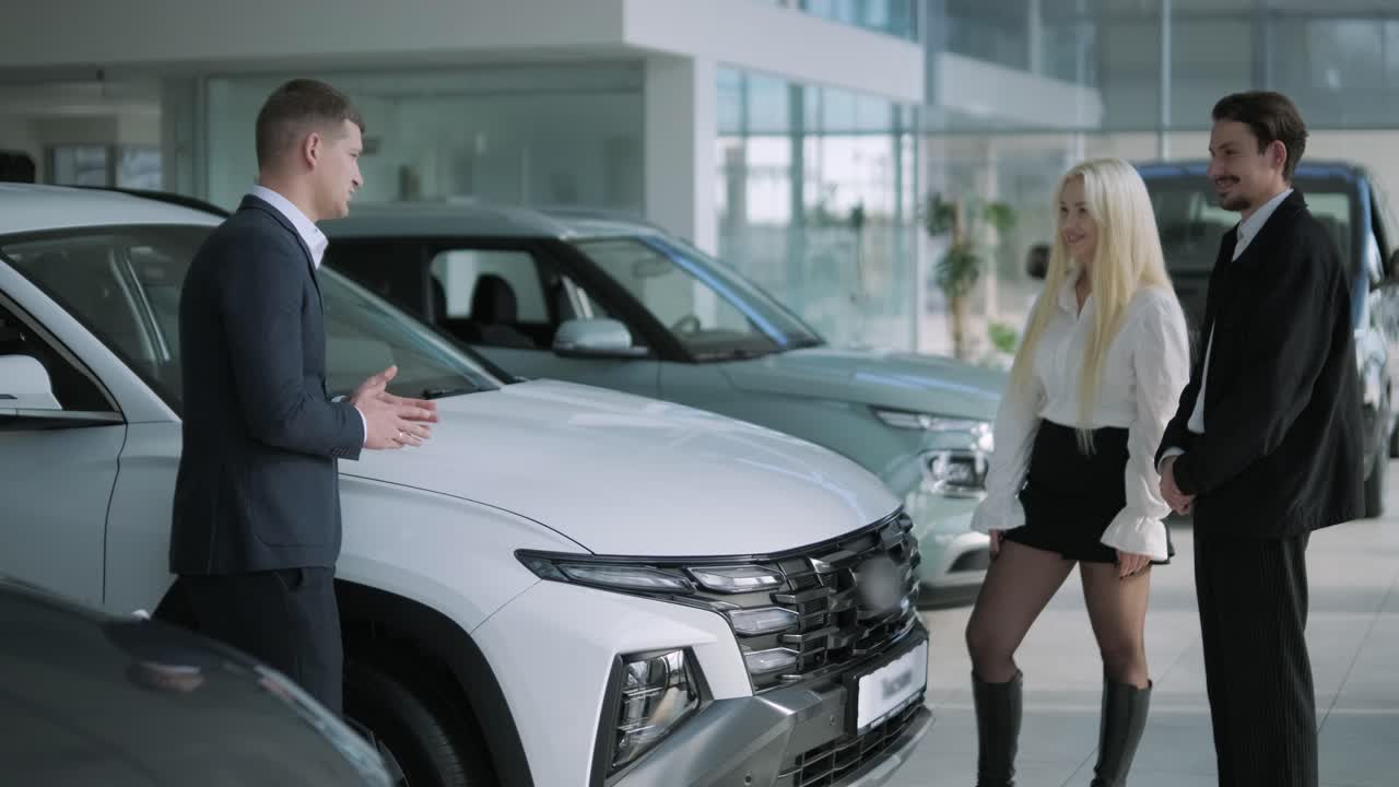 Couple Buying a Car at the Dealership